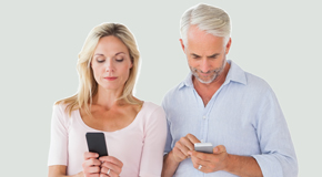 Sitka couple using smartphones